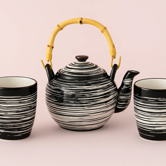 Teiera e tazze - Eleganza artigianale e preziosa ghiottoneria